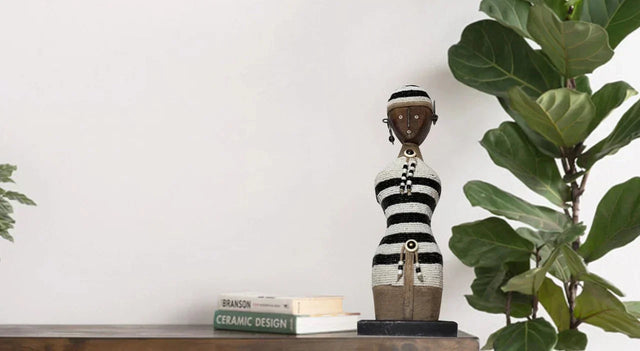 Handmade African Namji Doll from 54kibo makes for a unique housewarming gift for homeowners that love conversation-starters.