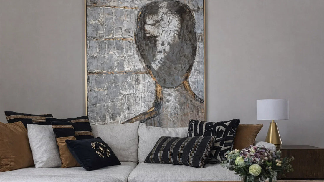 Large figurative artwork above sofa, designing for identity not trends