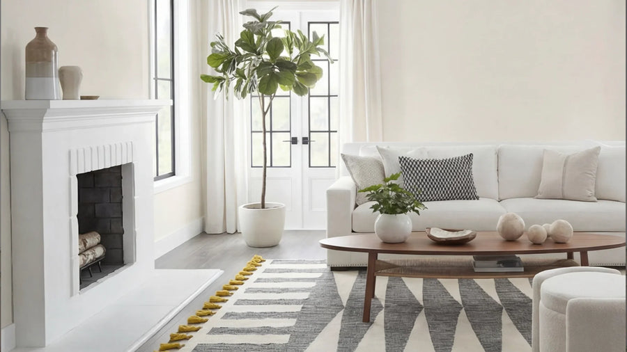 Calm living room with sofa and fireplace, signs your home is out of sync with your life