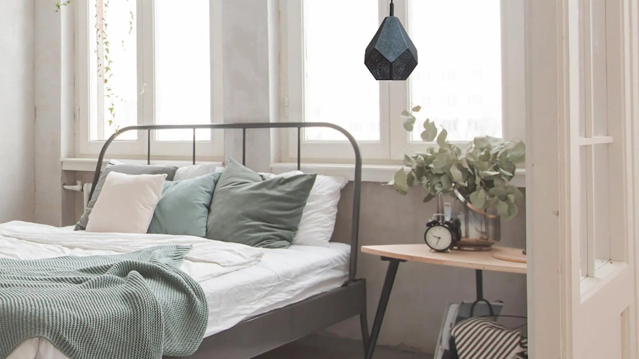 Modern bedroom decor ideas include the Almas Black Bedroom Light Fixture from 54kibo.