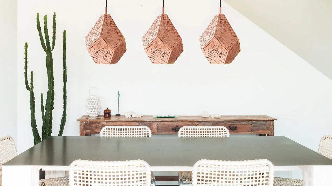 Contemporary farmhouse dining room with handmade African Almas Modern Geometric Pendant Lighting from 54kibo.