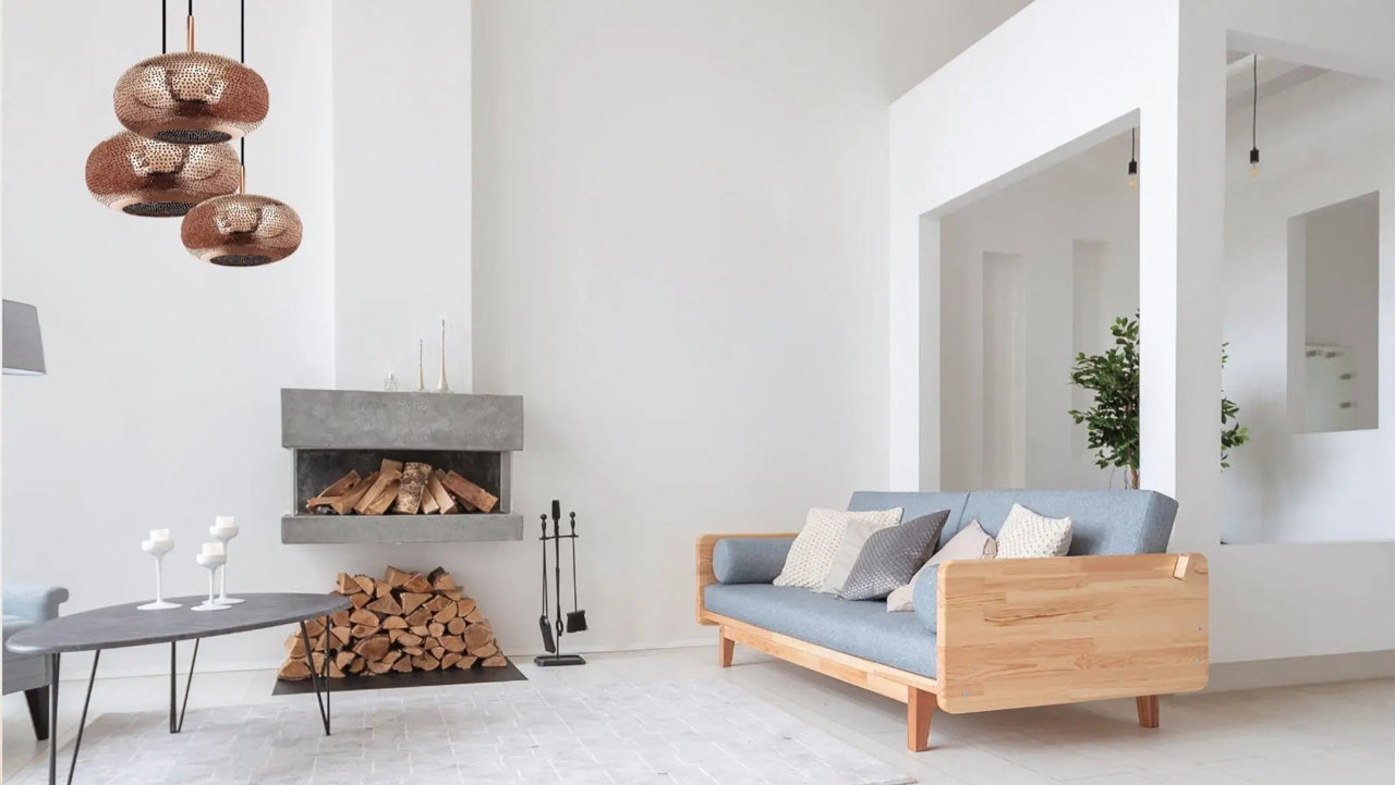 Lila Living Room Chandelier illuminates a modern minimalist living room.
