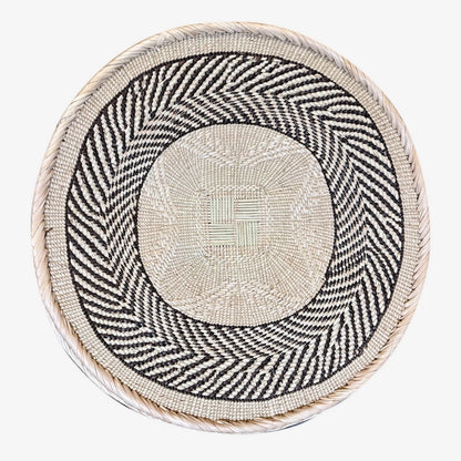 Natural fiber Tonga wall basket handwoven in Zimbabwe, with brown and  neutral weave, flat back