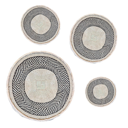 Natural fiber Tonga wall basket handwoven in Zimbabwe, brown and neutral weave, flat back with large, medium and small set
