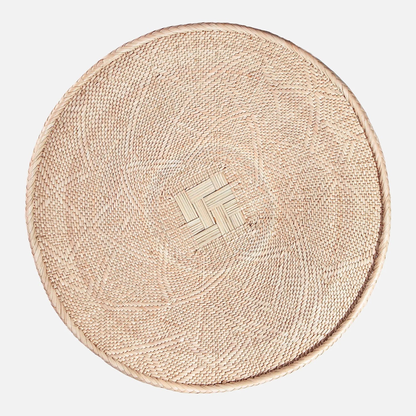 Round Binga wall basket handwoven in Zimbabwe, neutral natural fiber with geometric weave