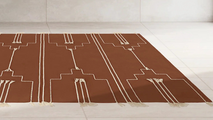 Low-pile earth-toned kitchen rugs bring warmth and ease to any kitchen, just like this Wool Rust Brown Rug from 54kibo.